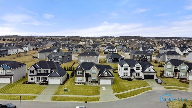 drone / aerial view with a residential view