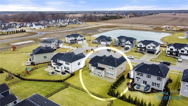 drone / aerial view with a residential view