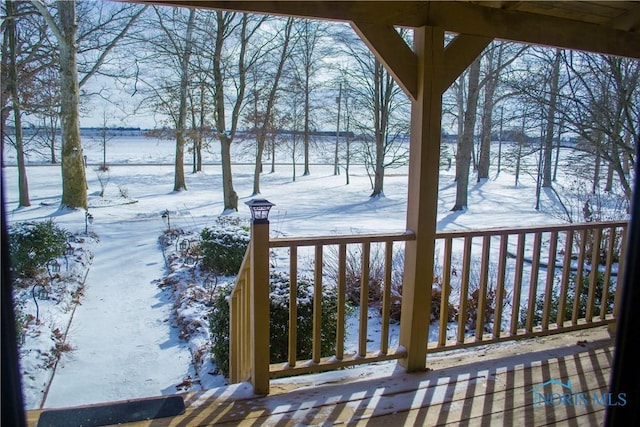 view of snow covered deck