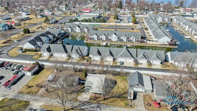 aerial view with a residential view and a water view