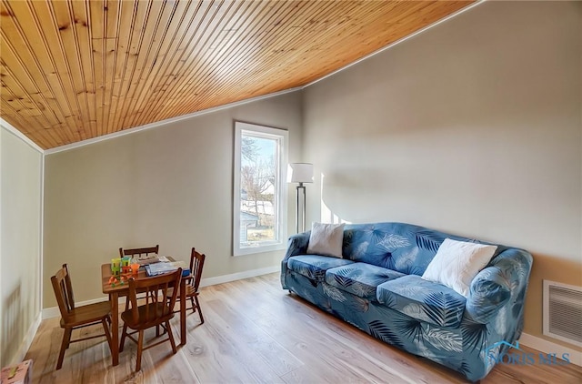 living room featuring wood finished floors, visible vents, ornamental molding, vaulted ceiling, and wood ceiling