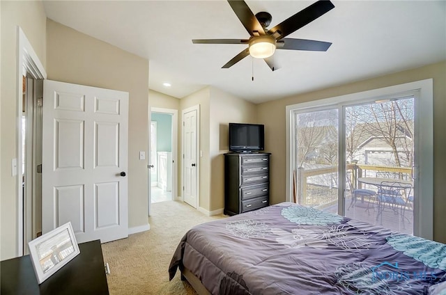 bedroom with light carpet, ceiling fan, baseboards, and vaulted ceiling