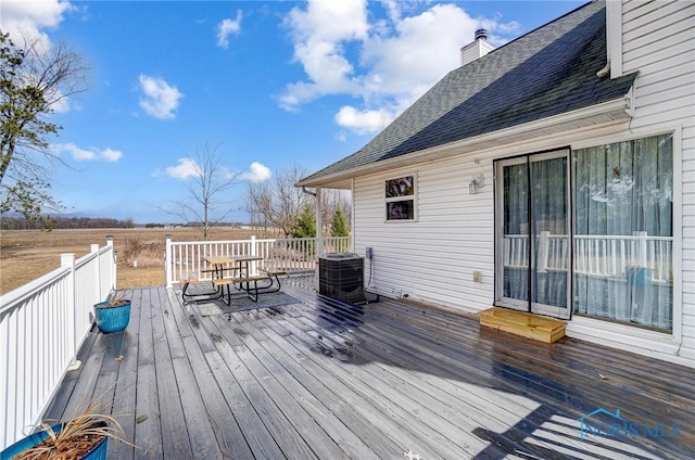 wooden terrace featuring central air condition unit