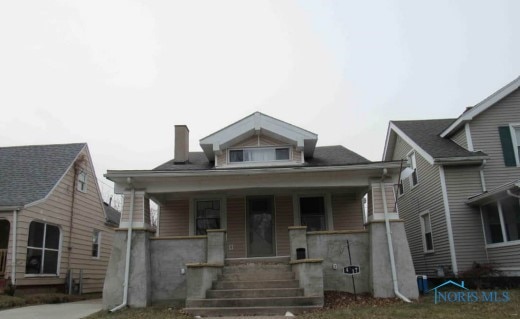 bungalow-style home with a porch