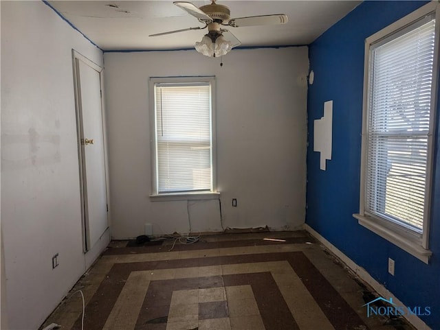 empty room featuring a ceiling fan