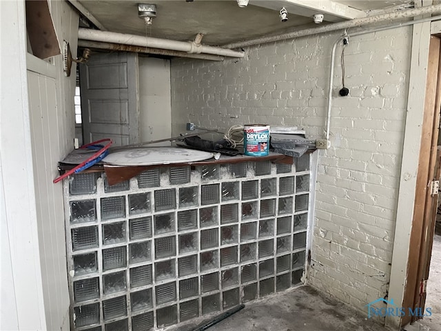 details with concrete flooring and concrete block wall