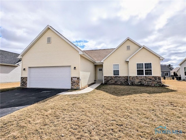 ranch-style house with a garage, stone siding, and aphalt driveway