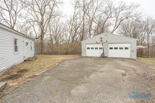 detached garage with fence