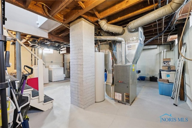 unfinished basement with heating unit, washing machine and dryer, and water heater