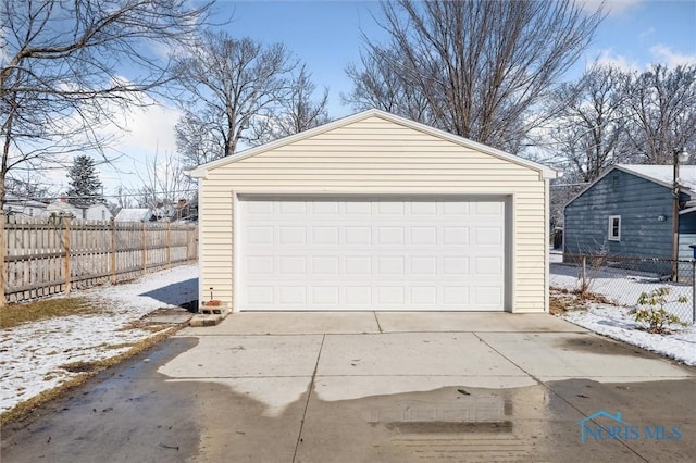 detached garage with fence