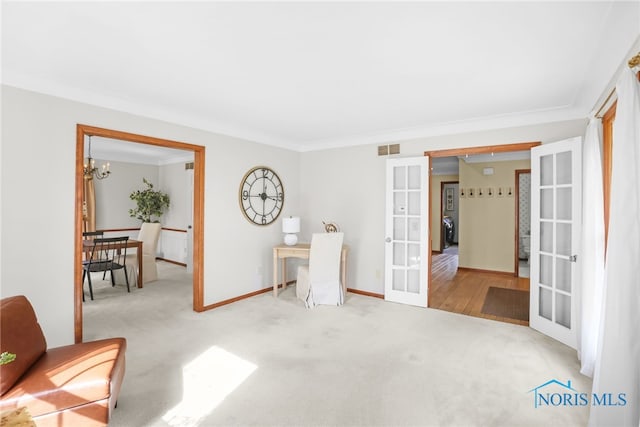 5605 Weckerly Rd, Whitehouse, OH 43571 - living area with an inviting chandelier, carpet floors, french doors, and visible vents