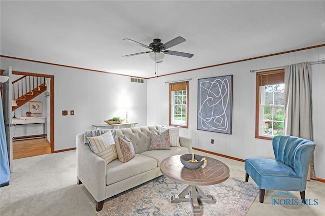 5605 Weckerly Rd, Whitehouse, OH 43571 - carpeted living area with baseboards, ornamental molding, a ceiling fan, and visible vents