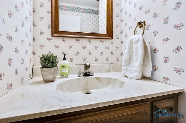 5605 Weckerly Rd, Whitehouse, OH 43571 - bathroom featuring wallpapered walls and vanity