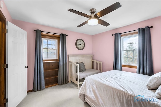 5605 Weckerly Rd, Whitehouse, OH 43571 - bedroom with a ceiling fan and light carpet