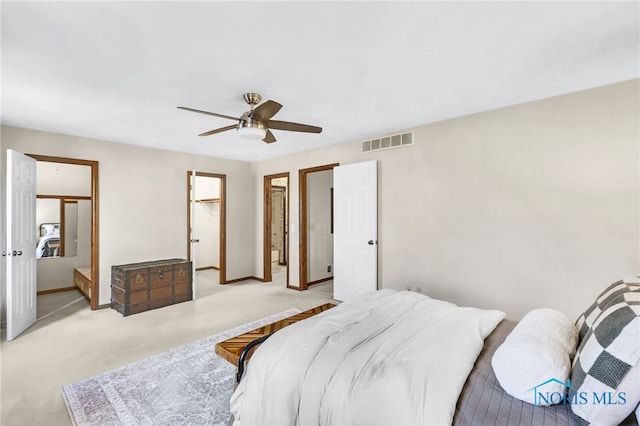 5605 Weckerly Rd, Whitehouse, OH 43571 - bedroom with visible vents, baseboards, ceiling fan, and light carpet