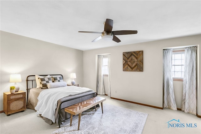 5605 Weckerly Rd, Whitehouse, OH 43571 - bedroom featuring light colored carpet, a ceiling fan, and baseboards