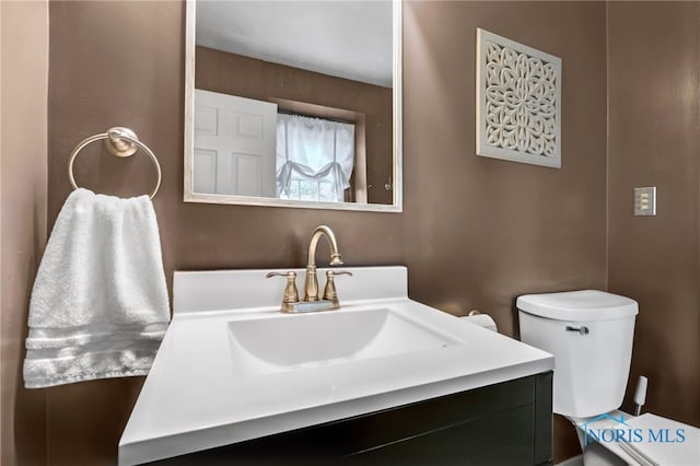 5605 Weckerly Rd, Whitehouse, OH 43571 - bathroom with toilet and vanity