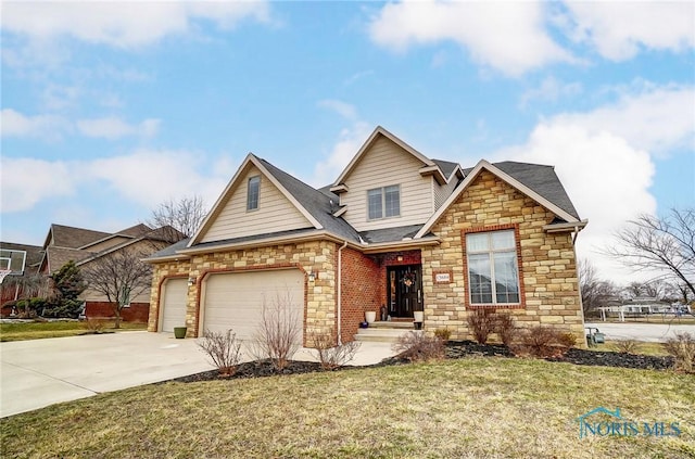 view of front of home featuring roof with shingles, concrete driveway, an attached garage, stone siding, and a front lawn