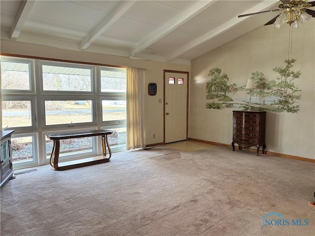 foyer featuring carpet, visible vents, lofted ceiling with beams, ceiling fan, and baseboards