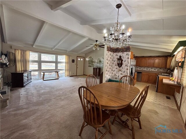 dining space with vaulted ceiling with beams, ceiling fan with notable chandelier, light carpet, and visible vents