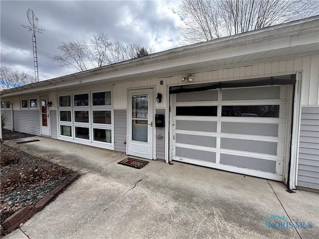 exterior space featuring a garage