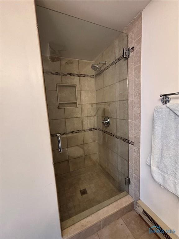 bathroom featuring a stall shower, visible vents, and tile patterned floors