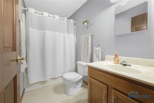 bathroom with shower / bath combo, vanity, and toilet