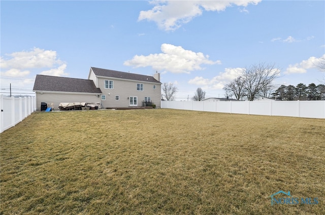 view of yard with a fenced backyard