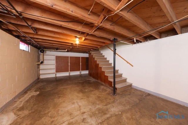 basement featuring stairway