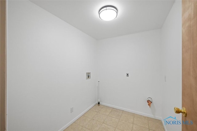 clothes washing area with laundry area, washer hookup, baseboards, light floors, and electric dryer hookup