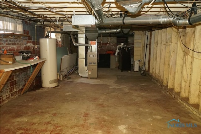 unfinished below grade area with water heater and heating unit