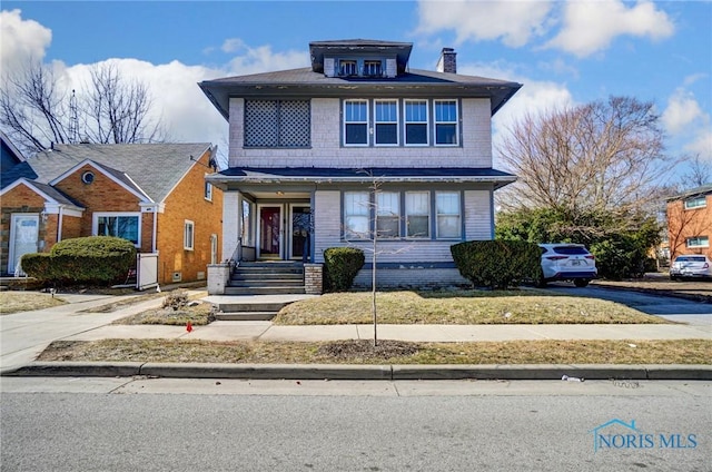 traditional style home with a chimney