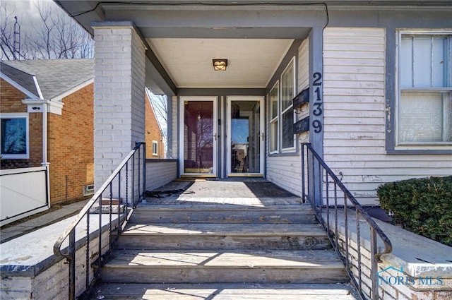 entrance to property with covered porch