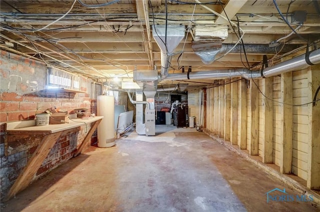 below grade area featuring heating unit and gas water heater