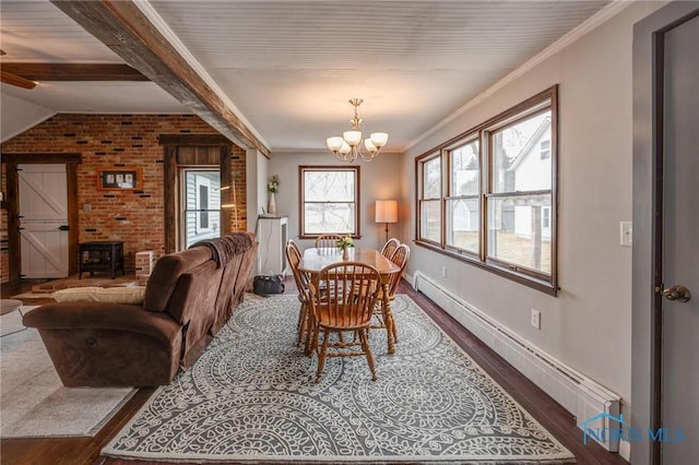 dining space with an inviting chandelier, ornamental molding, baseboards, dark wood-type flooring, and a baseboard heating unit