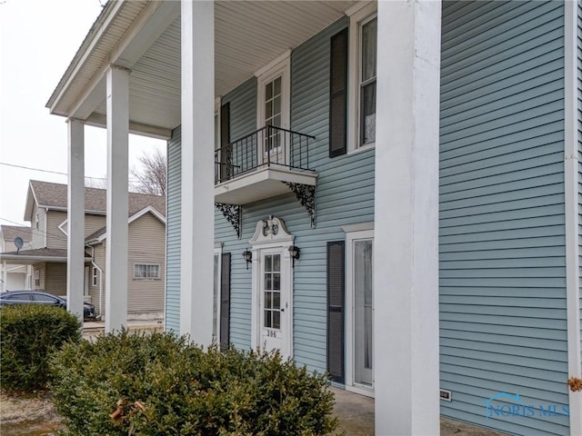 view of home's exterior featuring a balcony