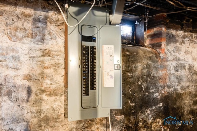 utility room featuring electric panel