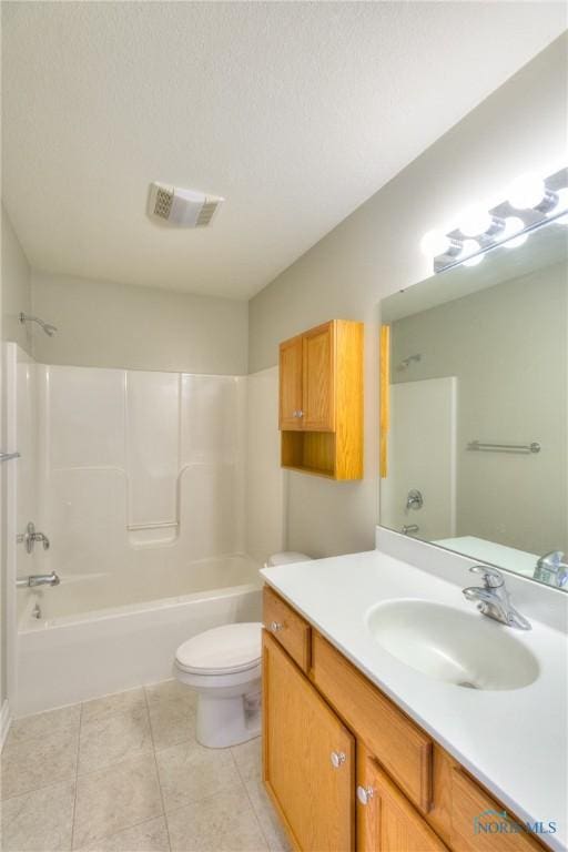 bathroom with visible vents, toilet, tile patterned floors, tub / shower combination, and vanity