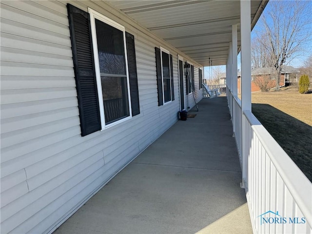 view of patio featuring a porch