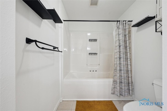 full bathroom featuring toilet, shower / bath combo with shower curtain, tile patterned flooring, and visible vents