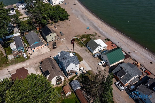 aerial view featuring a water view and a residential view