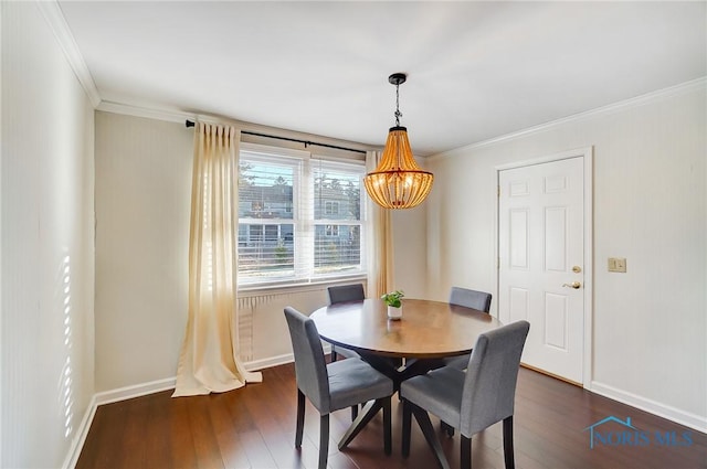 dining area featuring baseboards, a chandelier, and dark wood-style floors