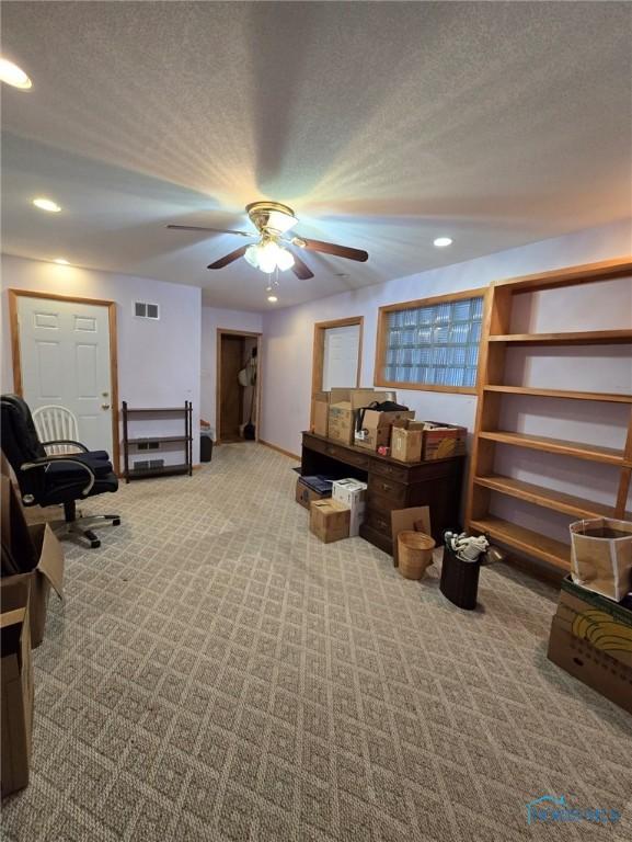 1934 Geffs Ave, Findlay, OH 45840 - living area featuring visible vents, carpet, recessed lighting, a textured ceiling, and a ceiling fan