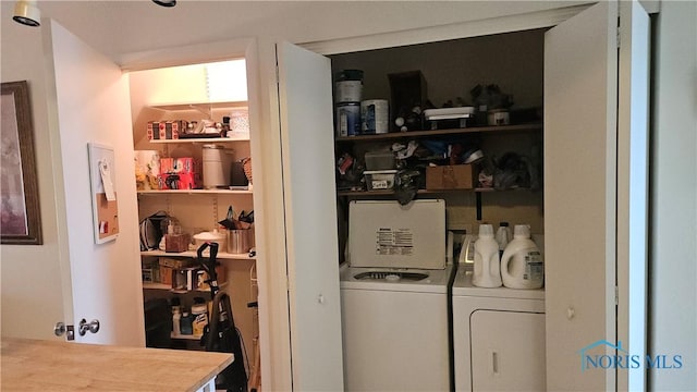 laundry room featuring laundry area and washing machine and clothes dryer