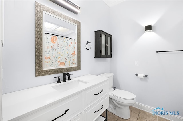 full bathroom featuring a shower with shower curtain, baseboards, toilet, vanity, and tile patterned flooring