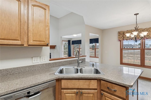 14540 Olde Trail Dr, Perrysburg, OH 43551 - kitchen with a sink, stainless steel dishwasher, a peninsula, light countertops, and hanging light fixtures