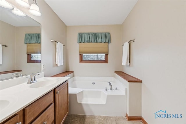 14540 Olde Trail Dr, Perrysburg, OH 43551 - full bathroom featuring a sink, a garden tub, and double vanity