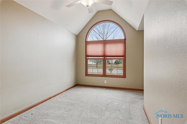14540 Olde Trail Dr, Perrysburg, OH 43551 - carpeted empty room with lofted ceiling, a ceiling fan, and baseboards