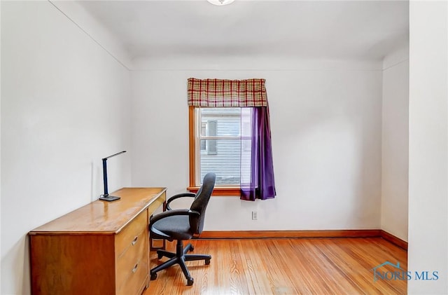 office featuring wood finished floors and baseboards