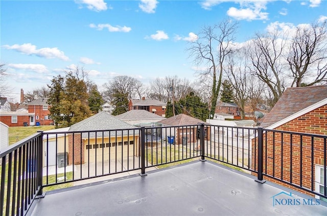 view of patio with a residential view and a balcony